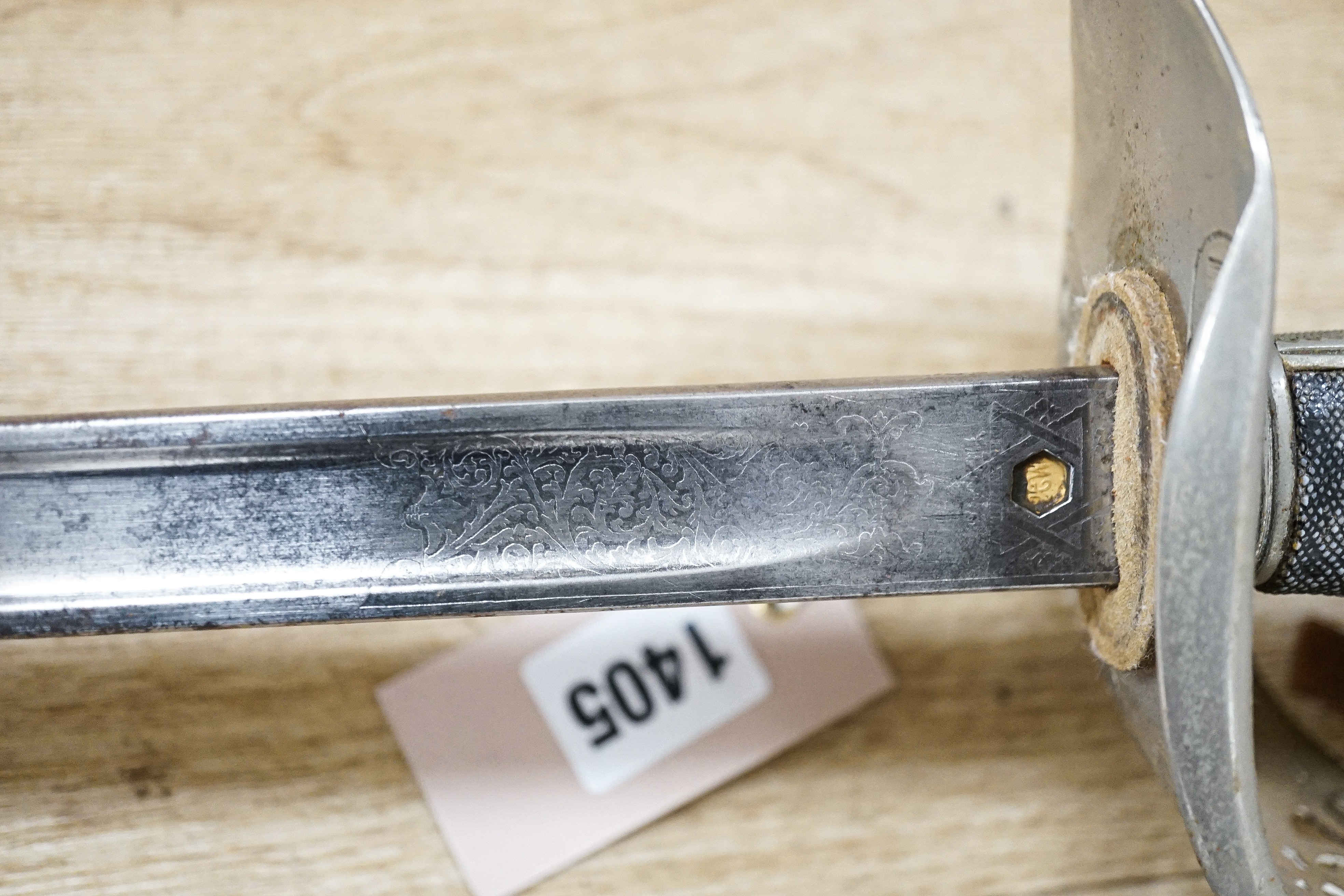 A George V Henry Wilkinson Royal Engineers dress sword with scabbard and cover, the blade etched GHL